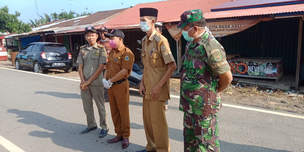 Penyemprotan Disinfektan di Fasilitas Umum Desa Pematang Rahim